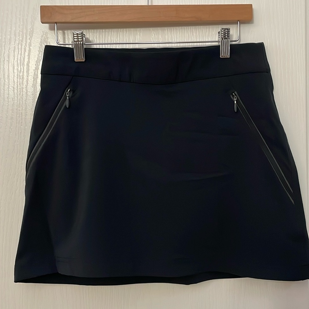 Columbia woman's tennis/golf active skort, spandex shorts underneath Size Small